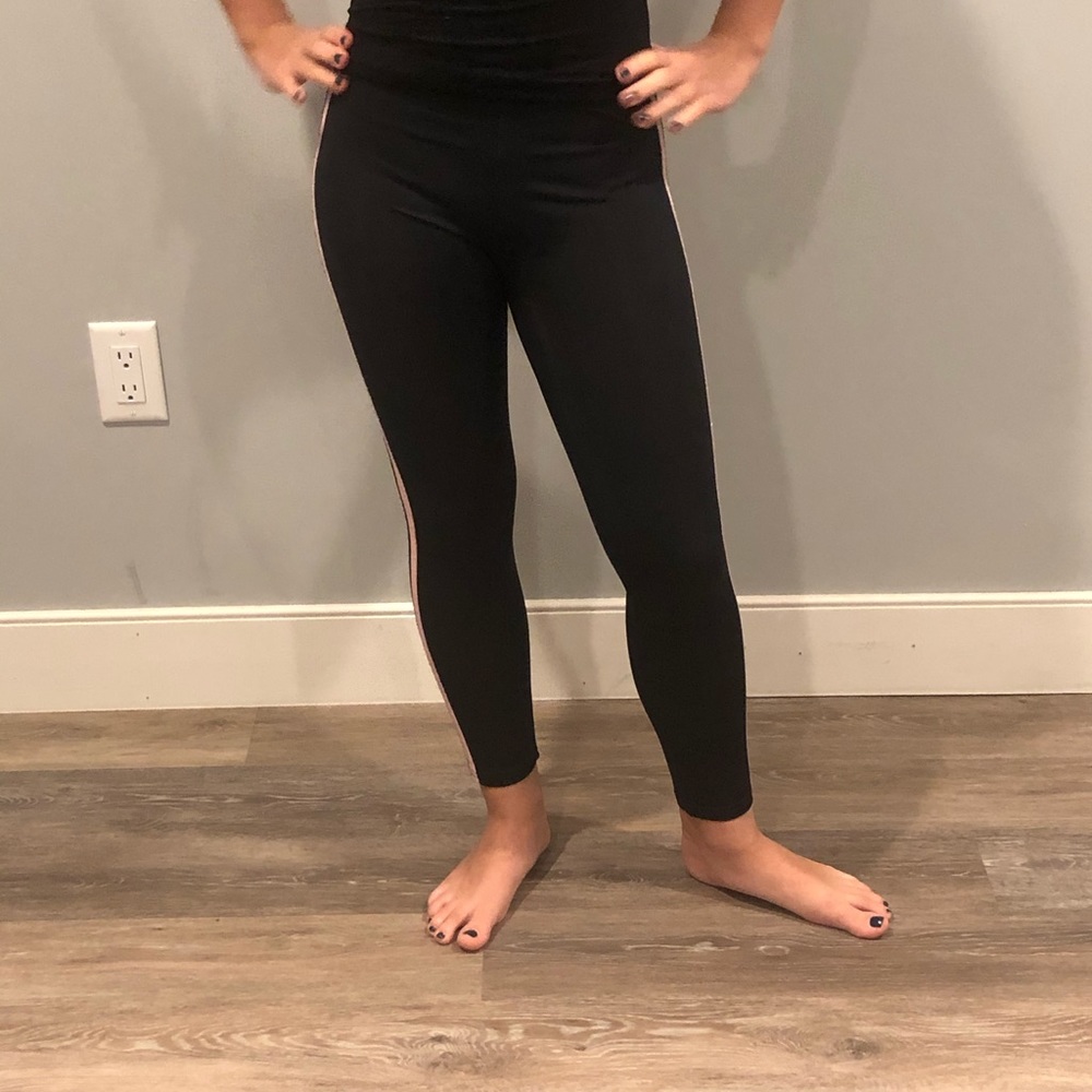 Black leggings with pink and silver stripe